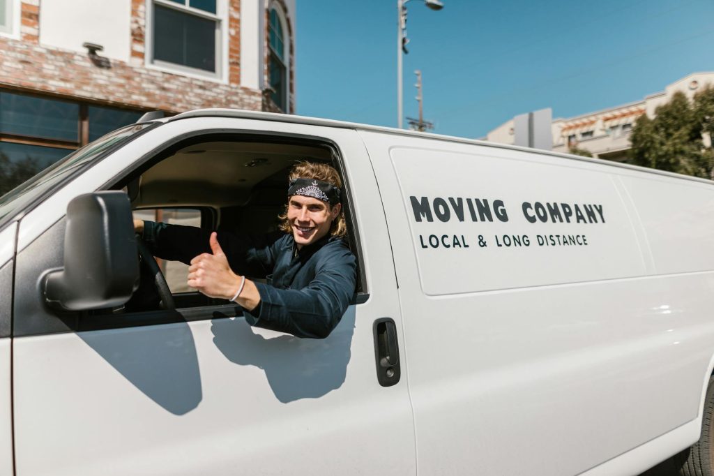 Professional movers in Kenya carefully loading furniture onto a truck for a reliable move.
